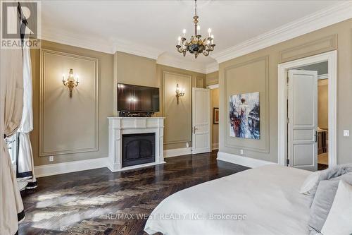 56 Ravenscrest Drive, Toronto (Princess-Rosethorn), ON - Indoor Photo Showing Bedroom With Fireplace