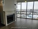 Ph4 - 50 Eglinton Avenue W, Mississauga, ON  - Indoor Photo Showing Living Room With Fireplace 