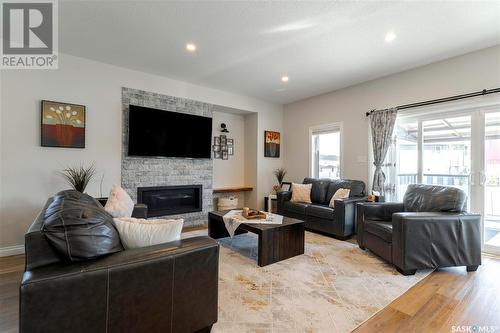 4825 Keller Avenue, Regina, SK - Indoor Photo Showing Living Room With Fireplace