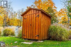 Pump house for the pool. One of many storage sheds included. - 