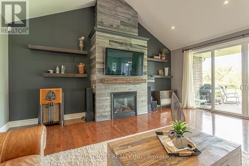 2290 Westchester Bourne, Thames Centre, ON - Indoor Photo Showing Living Room With Fireplace