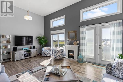 115 315 Kloppenburg Link, Saskatoon, SK - Indoor Photo Showing Living Room With Fireplace