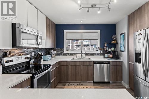 115 315 Kloppenburg Link, Saskatoon, SK - Indoor Photo Showing Kitchen With Stainless Steel Kitchen With Double Sink With Upgraded Kitchen