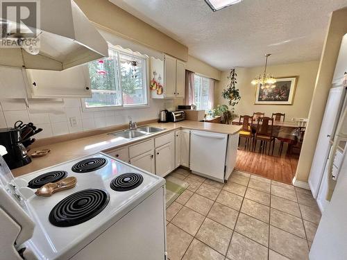150 S Enemark Road, Quesnel, BC - Indoor Photo Showing Kitchen With Double Sink