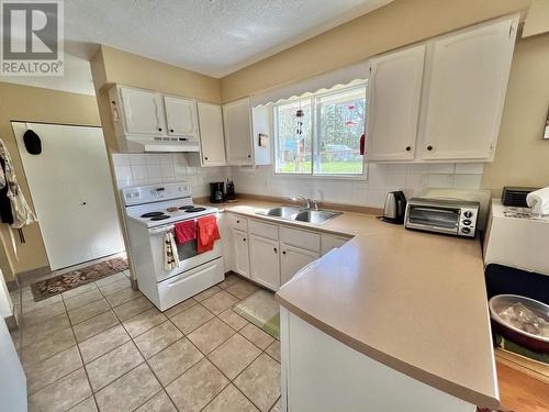 150 S Enemark Road, Quesnel, BC - Indoor Photo Showing Kitchen With Double Sink