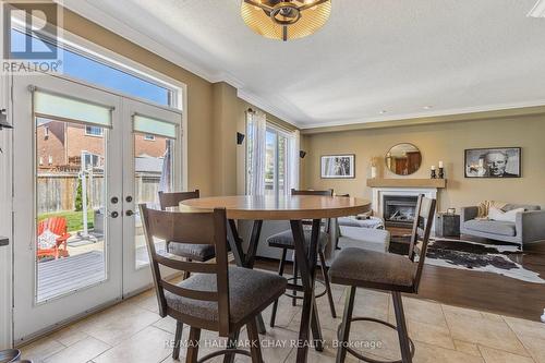 16 Spencer Drive, Barrie, ON - Indoor Photo Showing Dining Room With Fireplace
