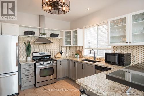166 Manley Lane, Milton, ON - Indoor Photo Showing Kitchen With Upgraded Kitchen