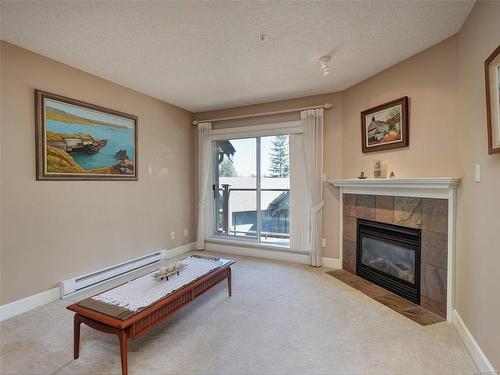 21-486 Royal Bay Dr, Colwood, BC - Indoor Photo Showing Living Room With Fireplace