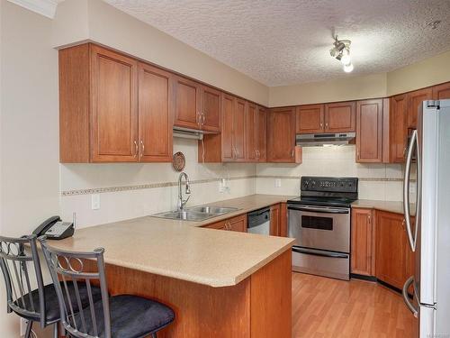 21-486 Royal Bay Dr, Colwood, BC - Indoor Photo Showing Kitchen With Double Sink