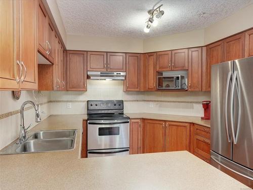 21-486 Royal Bay Dr, Colwood, BC - Indoor Photo Showing Kitchen With Double Sink