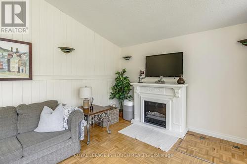 19 Pine Needles Drive, Tiny, ON - Indoor Photo Showing Living Room With Fireplace