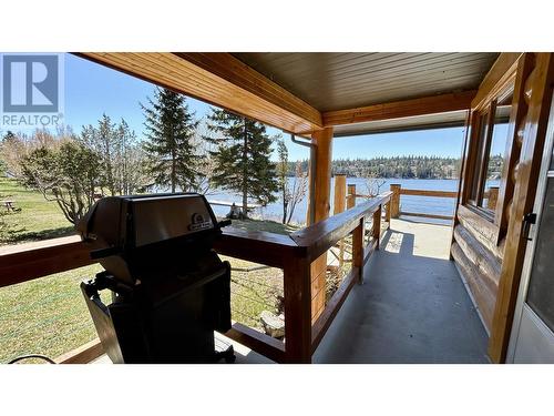 6126 Lakeshore Drive, Horse Lake, BC - Outdoor With Body Of Water With Deck Patio Veranda With Exterior