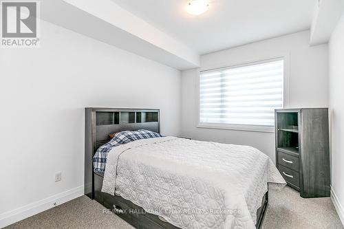205 - 299 Cundles Road E, Barrie, ON - Indoor Photo Showing Bedroom