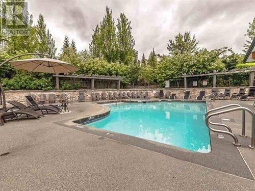 305 3156 Dayanee Springs Boulevard, Coquitlam, BC - Outdoor With In Ground Pool With Backyard