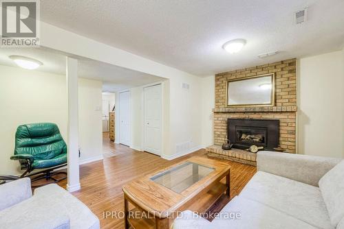 26 - 2120 Rathburn Road E, Mississauga, ON - Indoor Photo Showing Living Room With Fireplace
