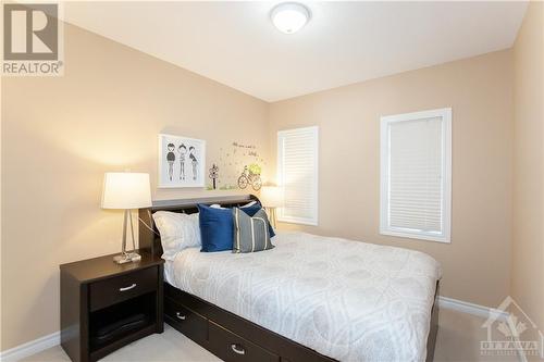 Second bedroom - 303 Grey Seal Circle, Ottawa, ON - Indoor Photo Showing Bedroom