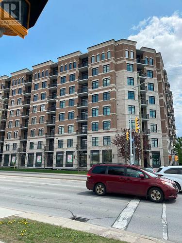 710 - 5917 Main Street, Whitchurch-Stouffville, ON - Outdoor With Balcony With Facade
