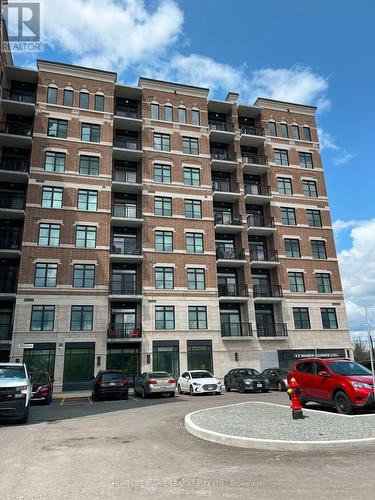 710 - 5917 Main Street, Whitchurch-Stouffville, ON - Outdoor With Balcony With Facade