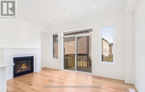 39 Bushwood Trail, Brampton, ON - Indoor Photo Showing Living Room With Fireplace