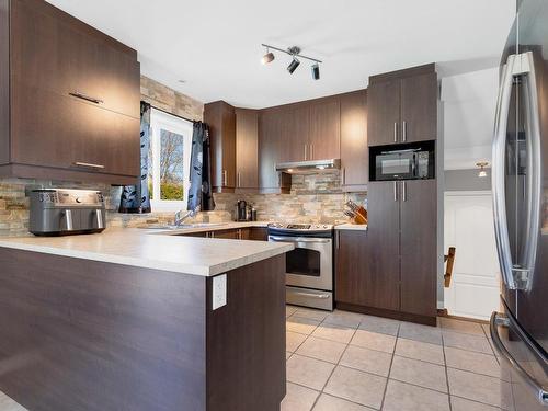 Cuisine - 328 Rue St-Antoine, Sainte-Anne-Des-Plaines, QC - Indoor Photo Showing Kitchen With Upgraded Kitchen