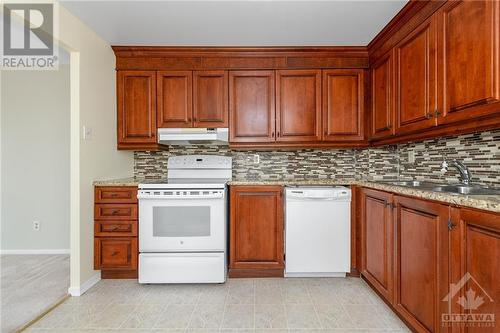 960 Teron Road Unit#902, Kanata, ON - Indoor Photo Showing Kitchen With Double Sink