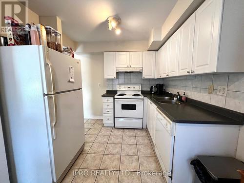14 - 800 Dundas Street W, Mississauga, ON - Indoor Photo Showing Kitchen With Double Sink