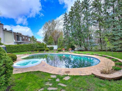Piscine - 19 Rue St-Judes, Laval (Chomedey), QC - Outdoor With In Ground Pool With Backyard