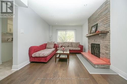 25 Oaklea Boulevard, Brampton, ON - Indoor Photo Showing Living Room With Fireplace