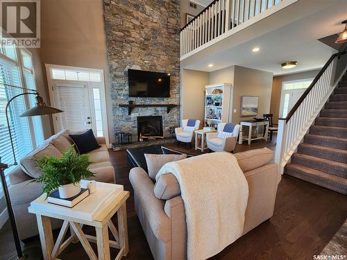 56 Elk Road, Crooked Lake, SK - Indoor Photo Showing Living Room With Fireplace