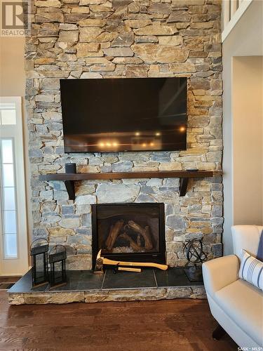 56 Elk Road, Crooked Lake, SK - Indoor Photo Showing Living Room With Fireplace