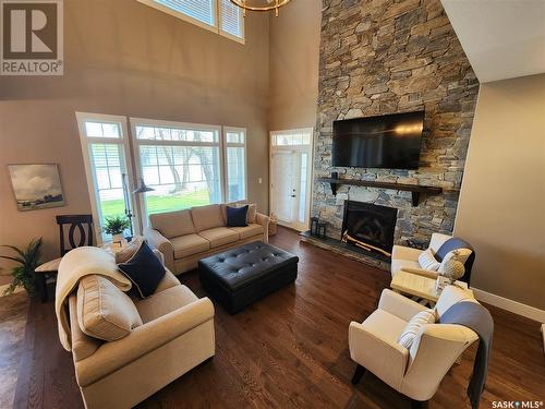 56 Elk Road, Crooked Lake, SK - Indoor Photo Showing Living Room With Fireplace