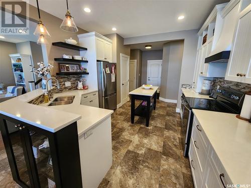 56 Elk Road, Crooked Lake, SK - Indoor Photo Showing Kitchen With Double Sink