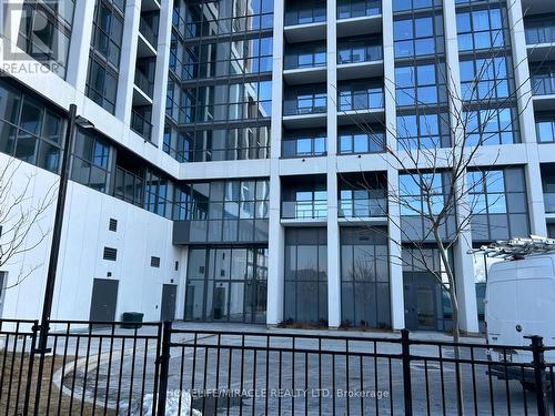 310 - 1063 Douglas Mccurdy Comm Circle, Mississauga, ON - Outdoor With Balcony With Facade