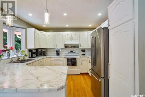 3119 Spicer Place E, Regina, SK - Indoor Photo Showing Kitchen With Double Sink
