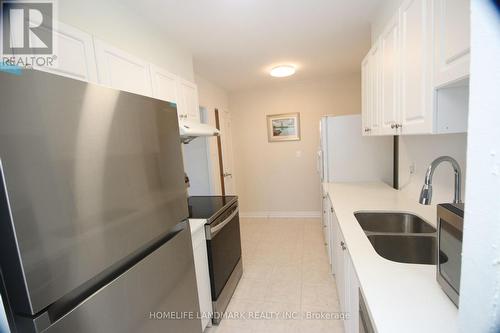 408 - 260 Seneca Hill Drive, Toronto, ON - Indoor Photo Showing Kitchen With Double Sink