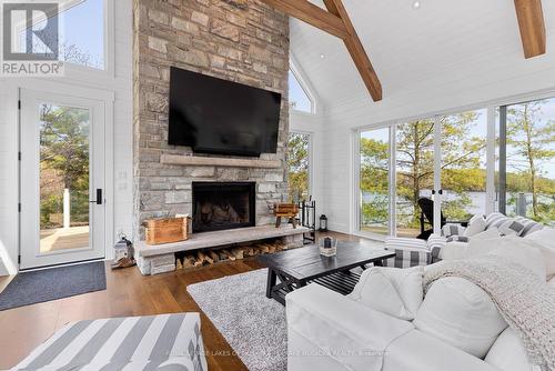 1086 Pennwood Road, Muskoka Lakes, ON - Indoor Photo Showing Living Room With Fireplace
