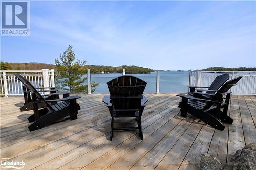 1086 Pennwood Road, Muskoka Lakes, ON - Outdoor With Body Of Water With Deck Patio Veranda