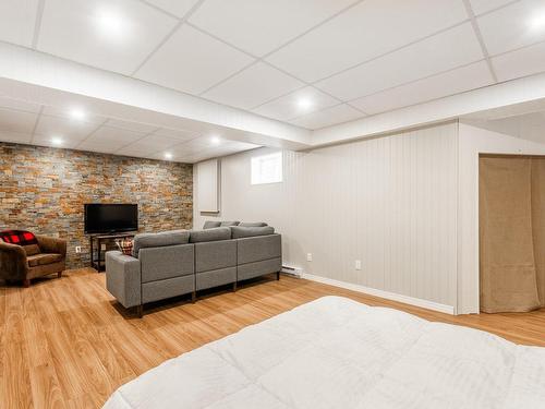 Family room - 31 Rue Des Sapins, Austin, QC - Indoor Photo Showing Basement