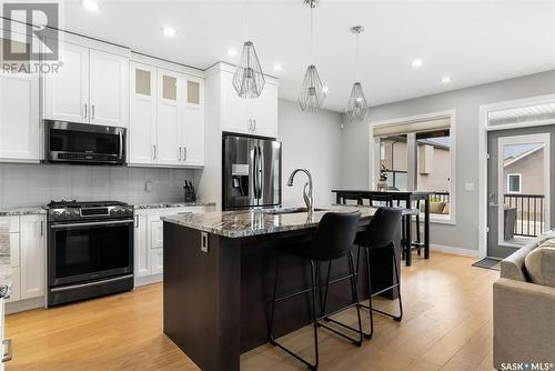 3933 Sandhill Crescent, Regina, SK - Indoor Photo Showing Kitchen With Stainless Steel Kitchen With Upgraded Kitchen
