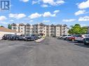 1547 Grand Marais West Unit# 403, Windsor, ON  - Outdoor With Balcony With Facade 