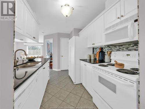 1547 Grand Marais West Unit# 403, Windsor, ON - Indoor Photo Showing Kitchen With Double Sink