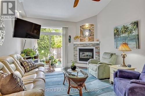 75 Chadwin Drive, Kawartha Lakes, ON - Indoor Photo Showing Living Room With Fireplace