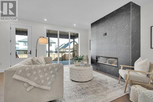 1914 Fountain Grass Drive, London, ON - Indoor Photo Showing Living Room With Fireplace