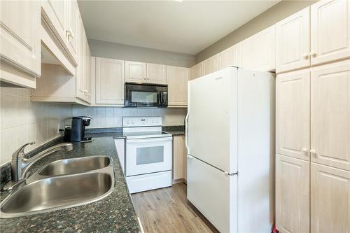 2075 Amherst Heights Drive|Unit #208, Burlington, ON - Indoor Photo Showing Kitchen With Double Sink