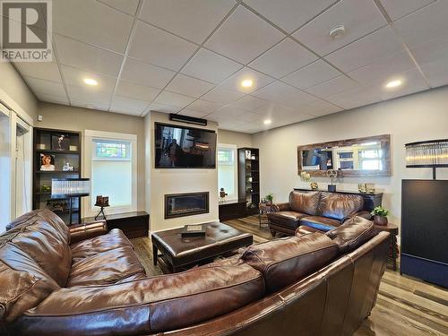 683 St Laurent Avenue, Quesnel, BC - Indoor Photo Showing Other Room With Fireplace