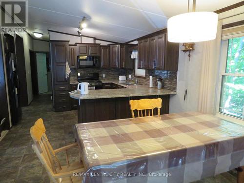 163 - 22790 Amiens Road, Middlesex Centre (Komoka), ON - Indoor Photo Showing Kitchen