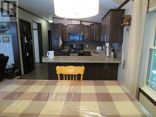 163 - 22790 Amiens Road, Middlesex Centre (Komoka), ON - Indoor Photo Showing Kitchen