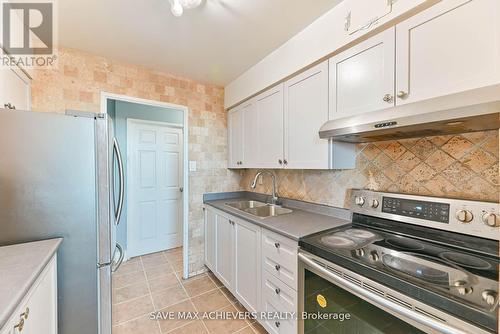 1004 - 3555 Derry Road, Mississauga, ON - Indoor Photo Showing Kitchen With Double Sink