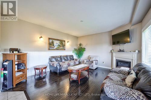 166 Shephard Avenue, New Tecumseth, ON - Indoor Photo Showing Living Room With Fireplace