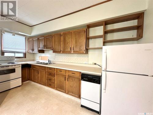 1341 97Th Street, North Battleford, SK - Indoor Photo Showing Kitchen With Double Sink